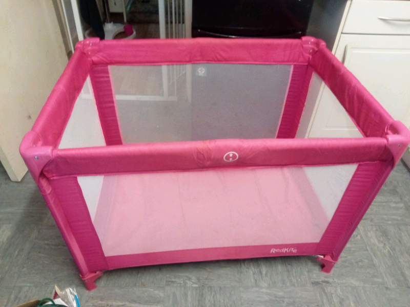 red kite travel cot pink